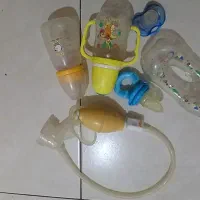 شیر دوش دستی به همراه سه شیشه شیر و دو پستونک