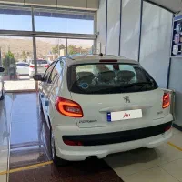 ۲۰۷ دنده ای پانا سفید سقف شیشه ای صفر نمایندگی1405