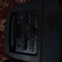 اسپیکر بزرگ چرخ دار دارای میکروفن و کنترل