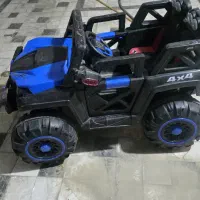 ماشین شارژی و دوچرخه