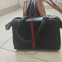 تعدادی کیف و لباس سایز بزرگ