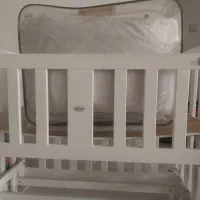 فروش تخت نوزاد کنار مادر