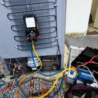 تعمیر تخصصی یخچال فریزر در محل با ابزار دیجیتال