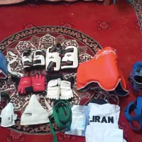 لوازم کامل تکواندو همراه کمربندها