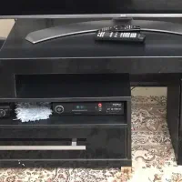 دو عدد میز تلویزیون چوبی و شیشه ای