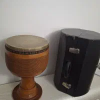 تنبک   به همراه  کیفش