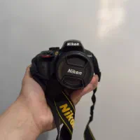 دوربین عکاسی نیکن d3400 به همراه لنز 18-55 vrو کیف