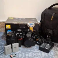 دوربین  حرفه ای و ۲ تا لنز به همراه وسایل جانبی