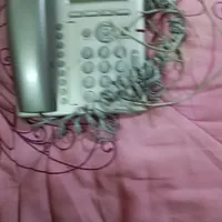 دو عدد تلفن ثابت،هر کدام ۴۵۰تومن