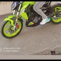 اموزش رانندگی موتورسواری با بنلی