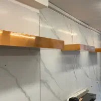 شلف دیواری مشکی و طلایی سایز ۶۵ در ۲۰ و ۴۰ در ۲۰