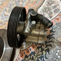 پمپ هیدرولیک پژو 405 و یک عدد دیکس ترمز کاملا سالم