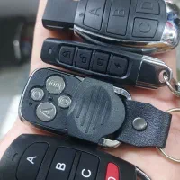 کپی انواع ریموت درب پارکینگ و دزدگیر خانه
