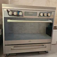 اجاق گاز ۵ شعله فر دار نوژن در حد نو