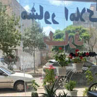 تجاری مسکونی بتن آرمه ۴باب مغازه در نبش زیتون ۹