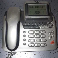 یک خط تلفن ثابت فروشی