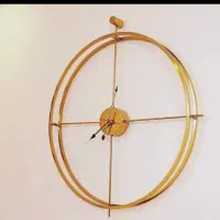 ساعت دیواری طلایی