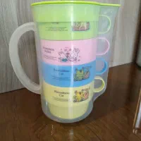 پارچ و فنجان. آبمیوه گیری. قاشق