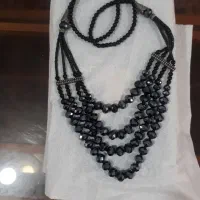 یک عدد گردنبند سنگی سرمه ای