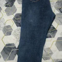 شلوار جین|لباس|شیراز, مبعث|دیوار