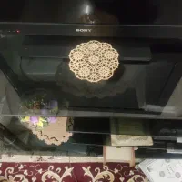 میز تلویزیون شیشه ای دو کشو