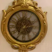 ساعت دیواری طلایی