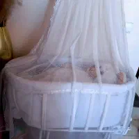 گهواره تخت کنار مادر