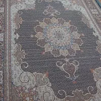 کارگر فرش ماهی