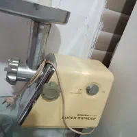 چرخ گوشت و اب میوه گیری