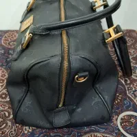 کیف|کیف، کفش، کمربند|مسجد سلیمان, |دیوار