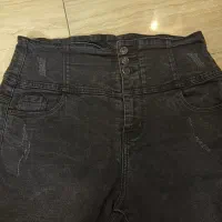 شلوار جین کشی گنی رنگ زغالی مناسب۴۲-۴۴