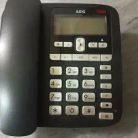 یک عدد تلفن رومیزی و یک عدد ماوس لیزری از برند خوب