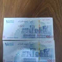 تعداد زیادی اسکناس با امضا همتی رنگ قرمز. توافقی