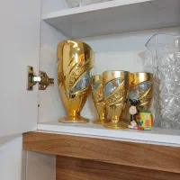 تنگ جام و پارچلیوان طلایی لیوان فرانسویی|ظروف سرو و پذیرایی|نیشابور, گنبد سبز|دیوار