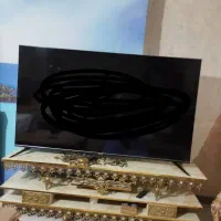 تلویزیون اسنوا ۷۵ نو با میز