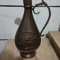 تنگ برنجی شیروخورشید