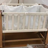 گهواره و تخت کنار مادر مارک جودیکو