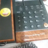 گوشی ثابت مارکش تو عکس موجوده