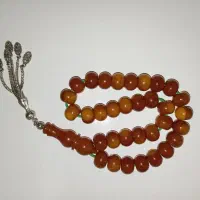 تسبیح کهربا با منگوله