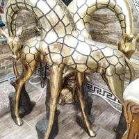 مجسمه زرافه طلایی دوتا بزرگ گل ارکیده قیمت پایین