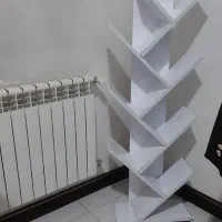 تخت خواب و کتابخونه