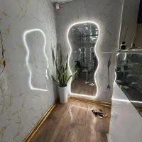 آینه دفرمه قدی و شیشه