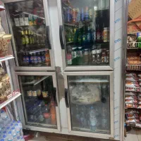 یخچال ایستاده دو طرف ویترین همه چی تمام