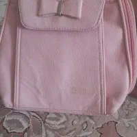 کیف پیش دبستانی و مجسمه