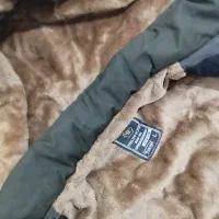 کاپشن|لباس|ایذه, |دیوار