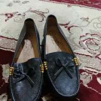 یک جفت کفش|کفش و لباس بچه|اهواز, کوروش|دیوار