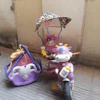سه چرخه و تاب کودک