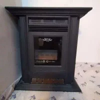 بخاری گازی طرح شومینه