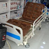 دستگاه اکسیژن ساز و تخت بیمارستانی