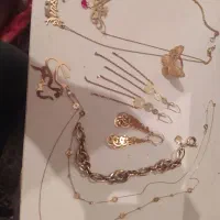 مقداری طلا و۲پلاک نسرین